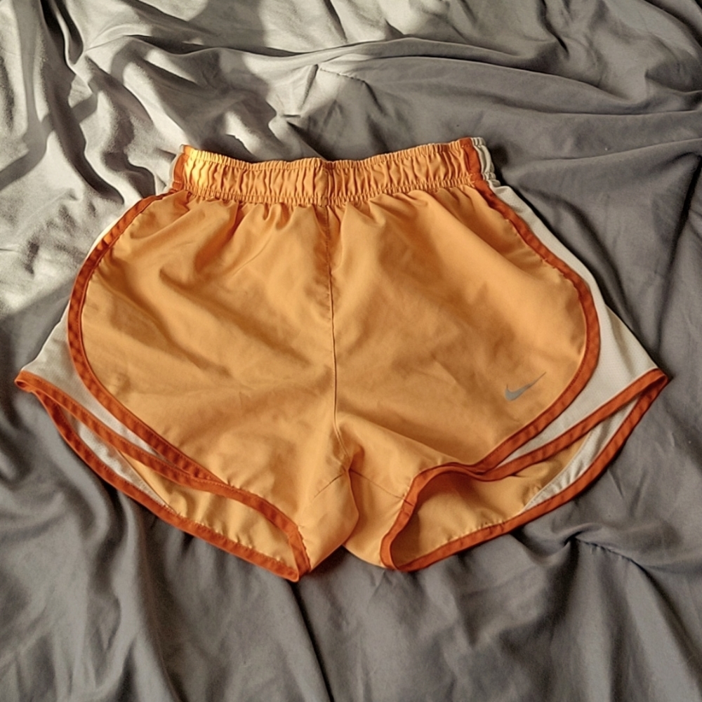 Orange nike shorts